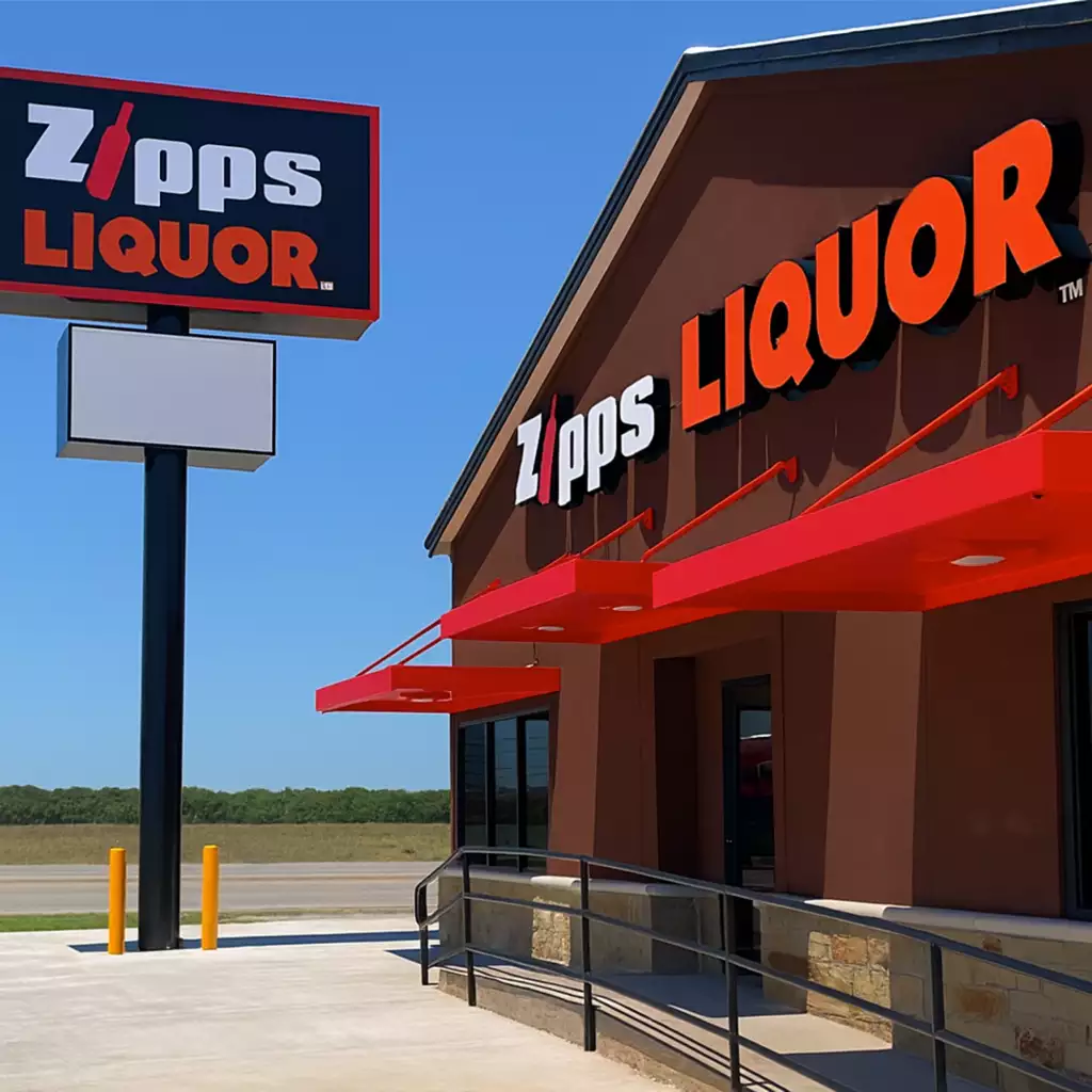 Zipps Liquor storefront in Mineral Wells, Texas with bright entrance and clear parking lot