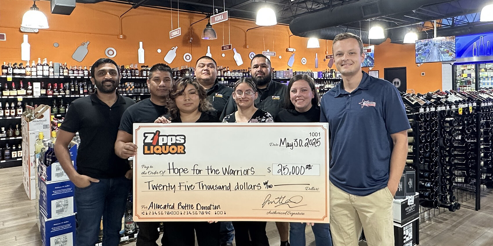 Donation Zipps Liquor staff supporting Texas nonprofit
