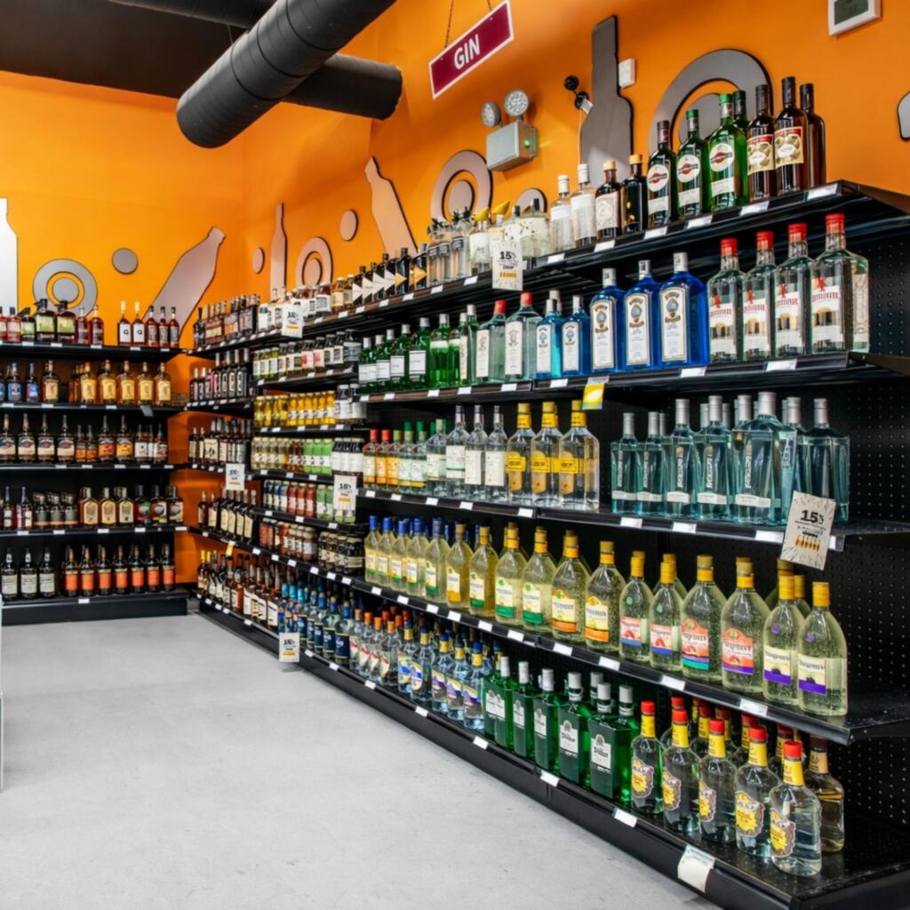 Faster Than a Drive to Lufkin: Nacogdoches' 6-Minute Cocktail Stop for SFA Game Days Wide selection of spirits wine and beer in clean well organized Texas liquor store interior