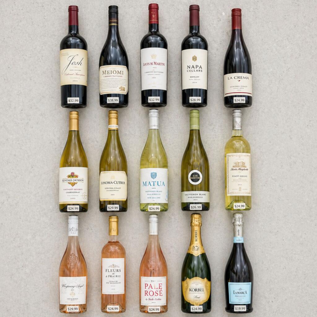  Fifteen wine bottles under 40 dollars arranged showing red, white, rosé, and sparkling varieties for Mother's Day