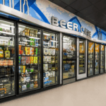 Zipps Beer Cave, Craft Beer Selection Across 35+ Texas Stores The interior of a Zipps Liquor beer cave with rows of stocked coolers