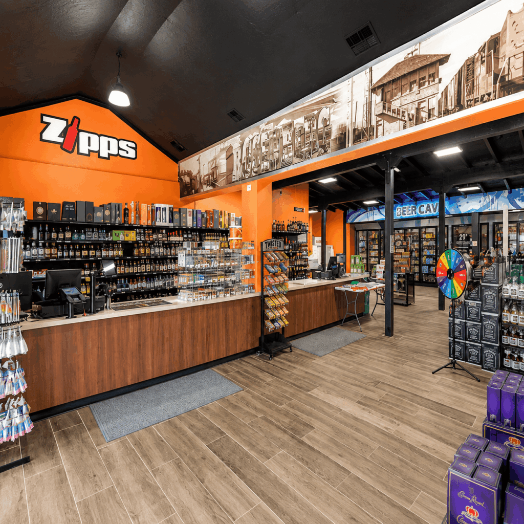 Zipps Beer Cave, Craft Beer Selection Across 35+ Texas Stores Wide interior view of a Zipps Liquor store showing the beer cave entrance
